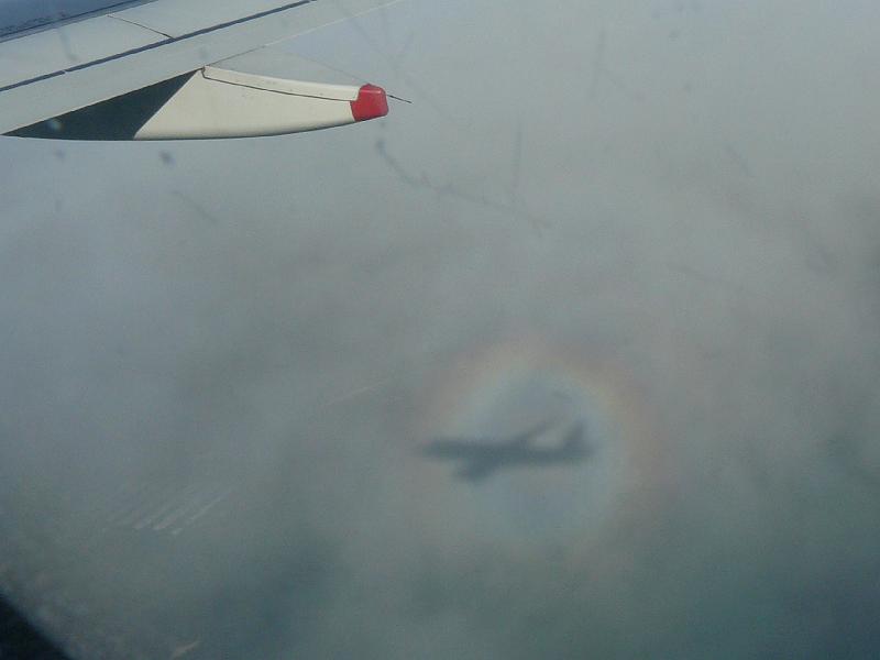 P1110305.JPG - ou can see the shadow of our plane in the clouds, plus a rainbow around the plane