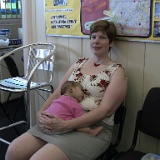 IMG 0208  Barb with our friends baby.  She is apprently very comfortable.